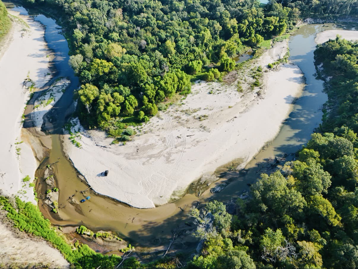 Small white sand island in the river